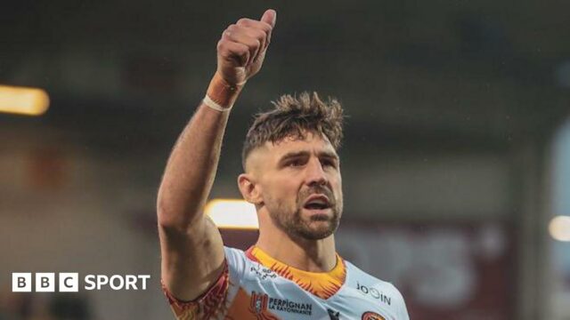 Catalans Dragons winger Tommy Makinson signals to the crowd during their game against Leeds Rhinos