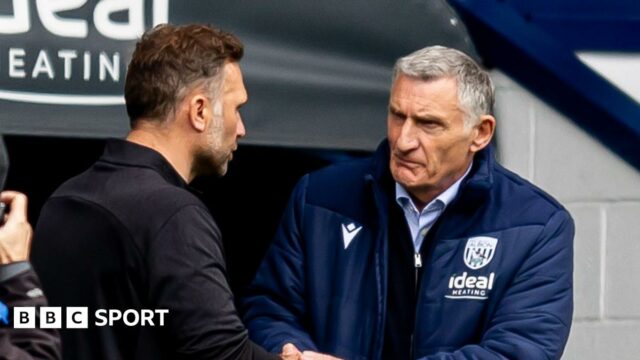John Eustace and Tony Mowbray shaking hands