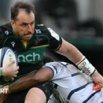 Burger Odendaal is tackled during Northampton's game against Castres