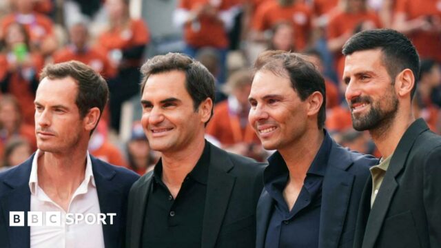 Rafael Nadal carries his son Rafael junior at the end of his French Open farewell ceremony
