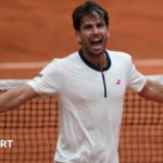 Cameron Norrie celebrates victory over Daniil Medvedev at the French Open