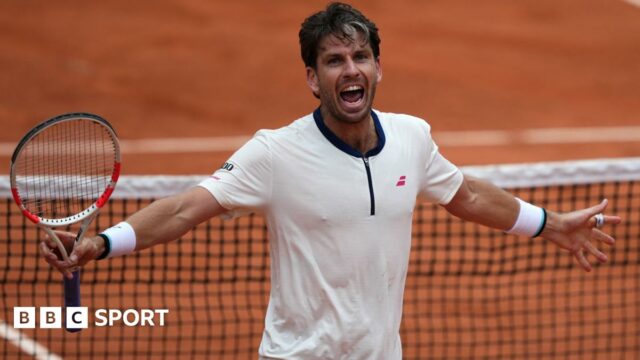Cameron Norrie celebrates victory over Daniil Medvedev at the French Open
