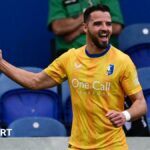Stephen McLaughlin celebrates for Mansfield Town scoring against Exeter City