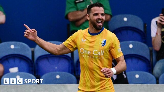 Stephen McLaughlin celebrates for Mansfield Town scoring against Exeter City