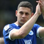Yousef Salech applauds Cardiff fans