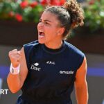 Jasmine Paolini with a clenched fist