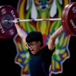 Albert Ian Delos Santos počas kategórie 67 kilometrov pre juniorských mužov vo svete mládeže a juniorských majstrovstiev.
