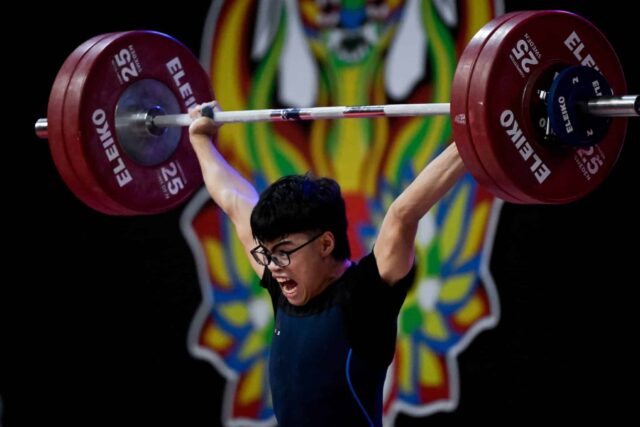 Albert Ian Delos Santos počas kategórie 67 kilometrov pre juniorských mužov vo svete mládeže a juniorských majstrovstiev.