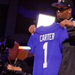 Phil Simms 'č. 11 odísť do dôchodku s gigantmi uprostred prehliadania Abdul Carter