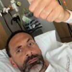 Rio Ferdinand à Mlle Arsenal vs PSG Couverture alors que Man Utd Legend partage le lit d'hôpital