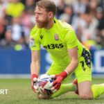 Stoke City goalkeeper Viktor Johansson holds the ball after making a save in the 0-0 draw at Derby