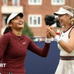 Emma Raducanu and Katie Boulter celebrate a point in their Queen's doubles match