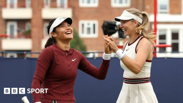 Emma Raducanu and Katie Boulter celebrate a point in their Queen's doubles match
