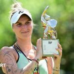 Marketa Vondrousova holds her Belin Open trophy