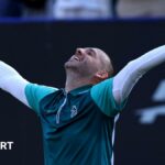 Jack Draper points to the home fans at Queen's