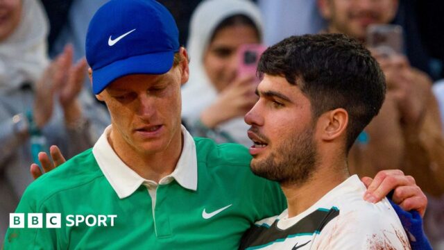 Carlos Alcaraz consoles Jannik Sinner following the French Open final