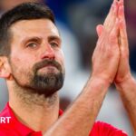 Novak Djokovic acknowledges the French Open crowd