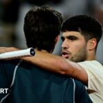 Carlos Alcaraz hugs Lorenzo Musetti