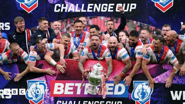 Hull KR players celebrate winning the Challenge Cup