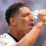 Jude Bellingham of Real Madrid pours water over his face at the Club World Cup