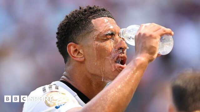 Jude Bellingham of Real Madrid pours water over his face at the Club World Cup
