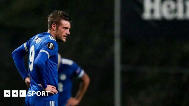 Jamie Vardy stands disappointed after a Europa League game