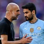 Pep Guardiola speaks with Ilkay Gundogan