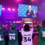 Saudi Arabia fans wave as Gianni Infantino makes a speech