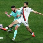 Rayan Ait-Nouri challenges the ball