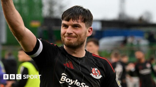 Philip Lowry applauds supporters