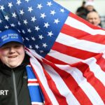 Rangers fan with a US flag