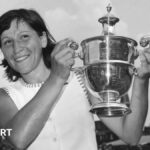 Olga Morozova holds the Queen's trophy