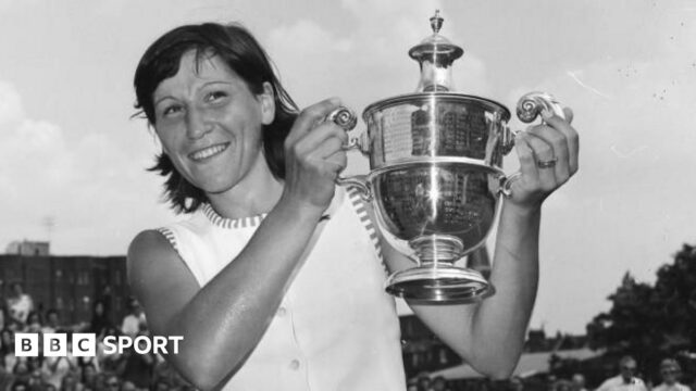 Olga Morozova holds the Queen's trophy