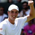 Oliver Tarvet celebrates his first-round win at Wimbledon