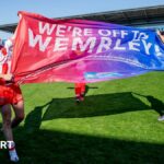 James Batchelor is embraced by a large number of his Hull KR teammates following a try in the Challenge Cup semi-final against Catalans