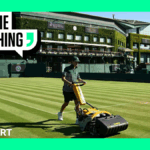 A groundskeeper mowing a court a Wimbledon