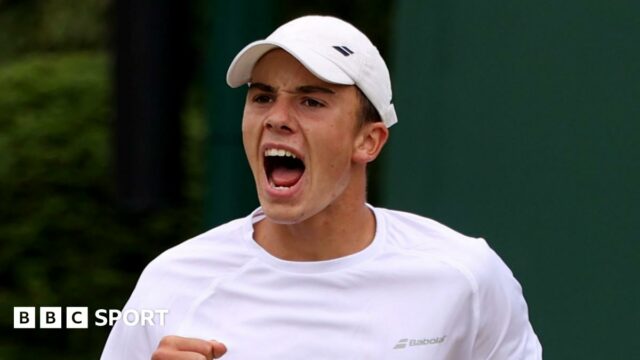 Oliver Tarvet serves the ball at Wimbledon qualifying