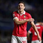Útočník Wrexham Paul Mullin súhlasil s účasťou na pôžičke sezóny po tom, čo padol v prospech Wigan Athletic