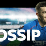 Tom Lawrence smiling along with gossip logo
