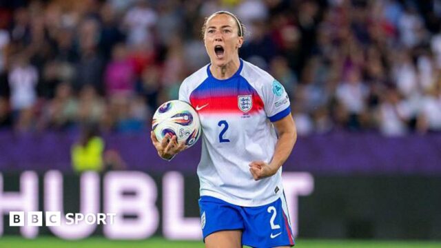 Lucy Bronze clenches her left fist and makes an emotional facial expression during England's Euro 2025 quarter-final