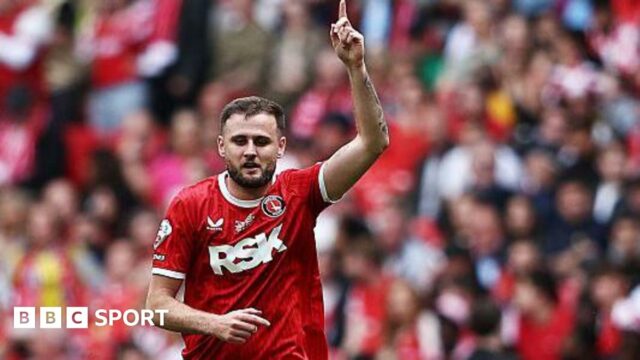 Macaulay Gillesphey celebrating his goal in the League One play-off final win over Leyton Orient last season