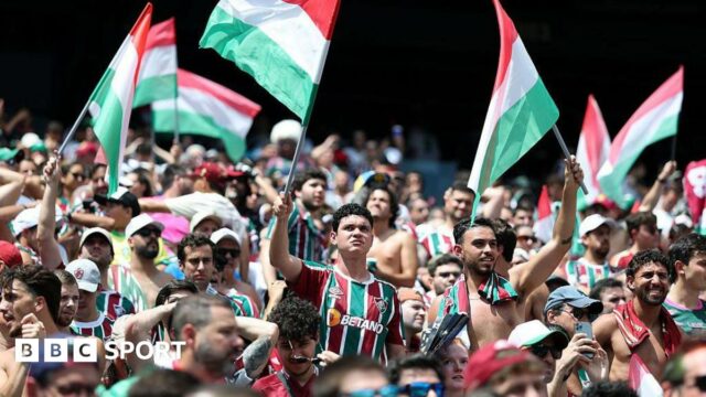 Fluminense fans raise flags in club colours