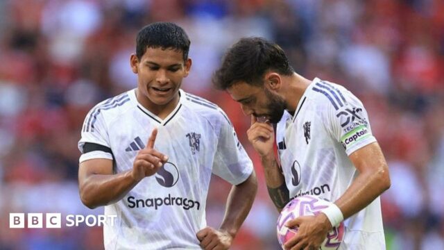 Diego Leon (left) in conversation with skipper Bruno Fernandes in Stockholm