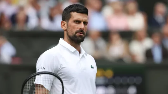 Novak Djokovic passes Roger Federer's legendary Wimbledon record image