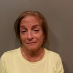 Olympijská zlatá medaila Mary Lou Retton du Mugshot bola prvýkrát videná po jeho šokujúcom zatknutí