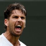 Cameron Norrie roars during his Wimbledon win over Nicolas Jarry