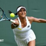Heather Watson stretches to try and connect with a forehand