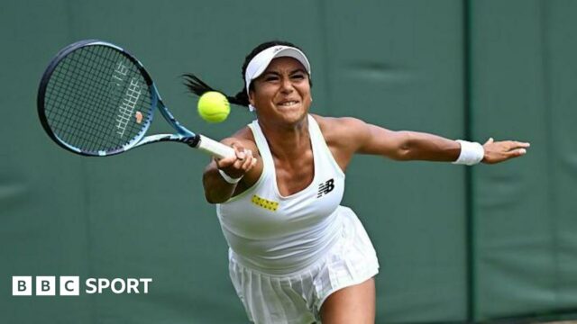 Heather Watson stretches to try and connect with a forehand