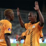 Zambia captain Barbra Banda raises both hands in the air as she celebrates a goal with team-mate Racheal Kundananji