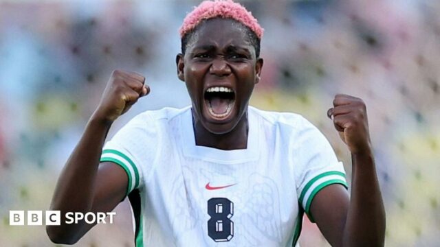 Asisat Oshoala celebrates while playing for Nigeria